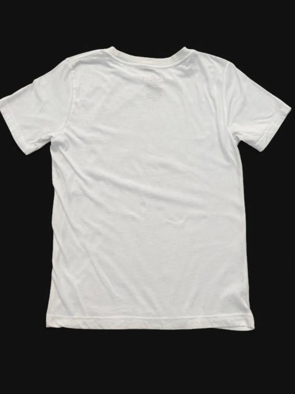 White Jordan kids t-shirt with red Air Jordan logo and 'Flight' text, size L